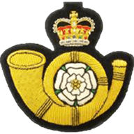 K.O.Y.L.I. crest